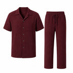 Noredane maroon shirt and drawstring trousers set on pure white background