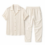 Norerino warm ivory textured shirt and drawstring trousers, studio flat lay