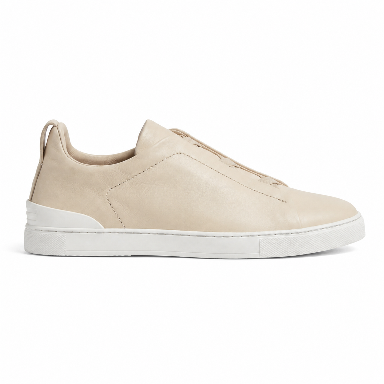 Bruce & Co Norvane beige minimalist slip-on sneakers side view
