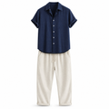 Orlian men's navy shirt and ivory trousers set on white studio background