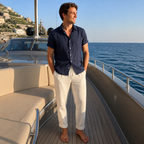 Man wearing the Orlian navy outfit on a Mediterranean yacht