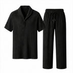Ornor black textured shirt and drawstring trousers set on pure white background