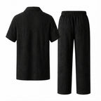 Ornor black textured shirt and drawstring trousers set rear view on pure white background