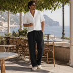 Ornor white shirt and black trousers styled in a coastal cafe