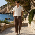 Orvento outfit styled on a Mediterranean cove path