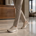 Bruce & Co Orvessa beige sneakers in a boutique hotel