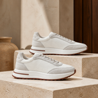 Orvessa White sneakers on travertine