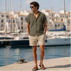 Palelian darkgreen shirt and stone shorts styled at a Mediterranean marina