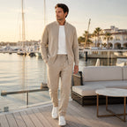 Palemont sand knit set styled on a marina terrace