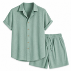 Palevane green ribbed shirt and shorts set on white studio background
