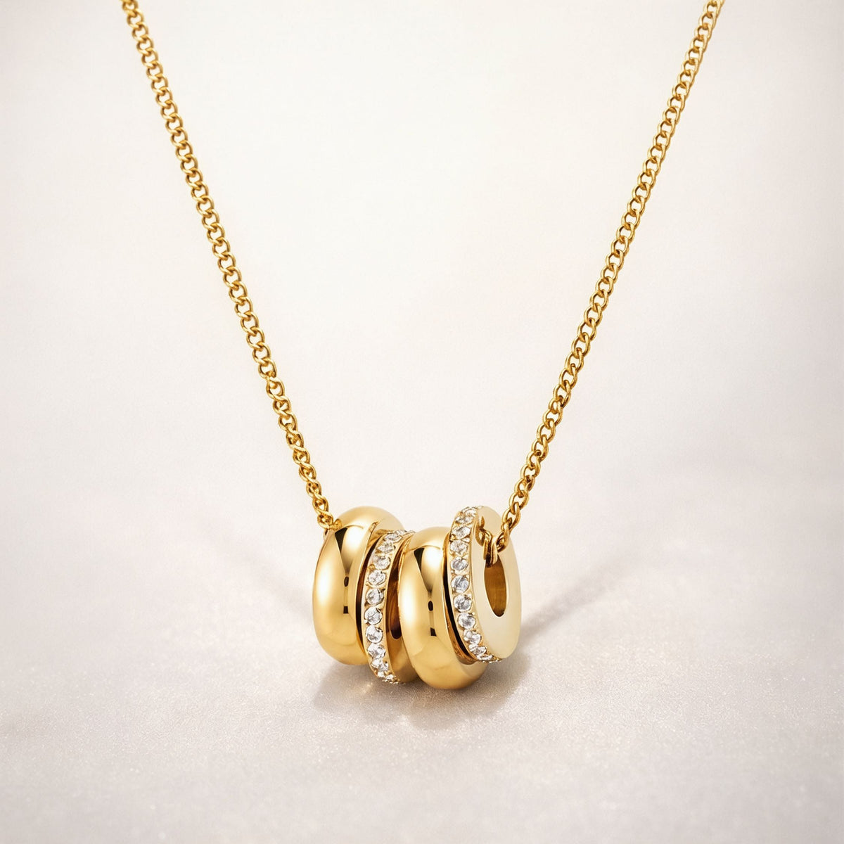 Bruce & Co Monte Carlo – Triple Ring Zircon Necklace
