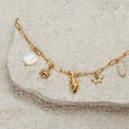 Bruce & Co Capri – Shell Sun and Pearl Charm Necklace