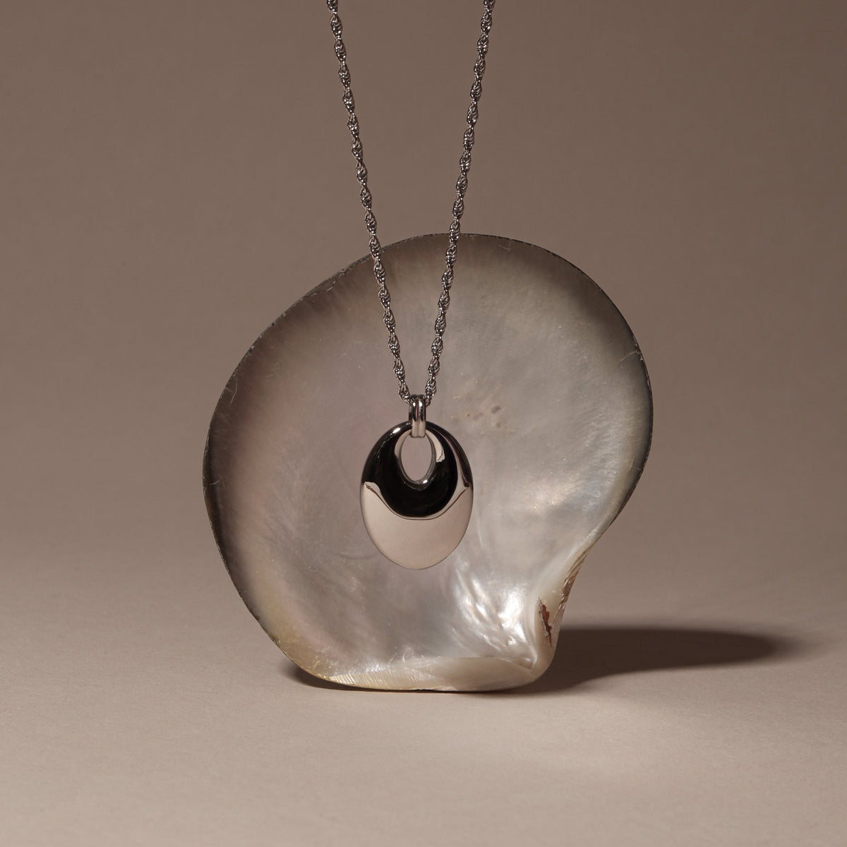 Bruce & Co Reverie – Oval Open Pendant Necklace, Stainless Steel