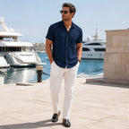 Rovevaro navy shirt styled at a luxury yacht marina