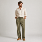 Selvaro olive linen trousers styled in a premium studio