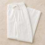 Selvaro white linen trousers folded editorial