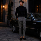 Seremora gray trousers styled beside a classic car at blue hour