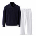 Seresaro navy cable-knit half-zip sweater and white tailored trousers on white