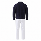 Rear view of the Seresaro navy sweater and white trousers set on white