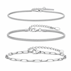 Three-piece silver stainless steel bracelet set, top-down studio view