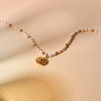 Bruce & Co Naoussa – Sun Charm Freshwater Pearl Necklace