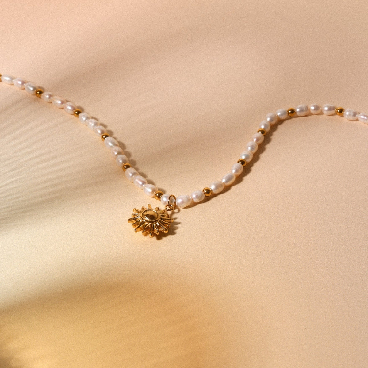 Bruce & Co Naoussa – Sun Charm Freshwater Pearl Necklace