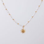 Bruce & Co Naoussa – Sun Charm Freshwater Pearl Necklace