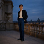 Tavedane navy herringbone trousers styled on a European terrace