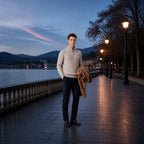 Urenor light gray sweater styled on a waterfront promenade