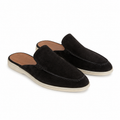 Bruce & Co Vellaro black suede-look open-back loafers on pure white, three-quarter view