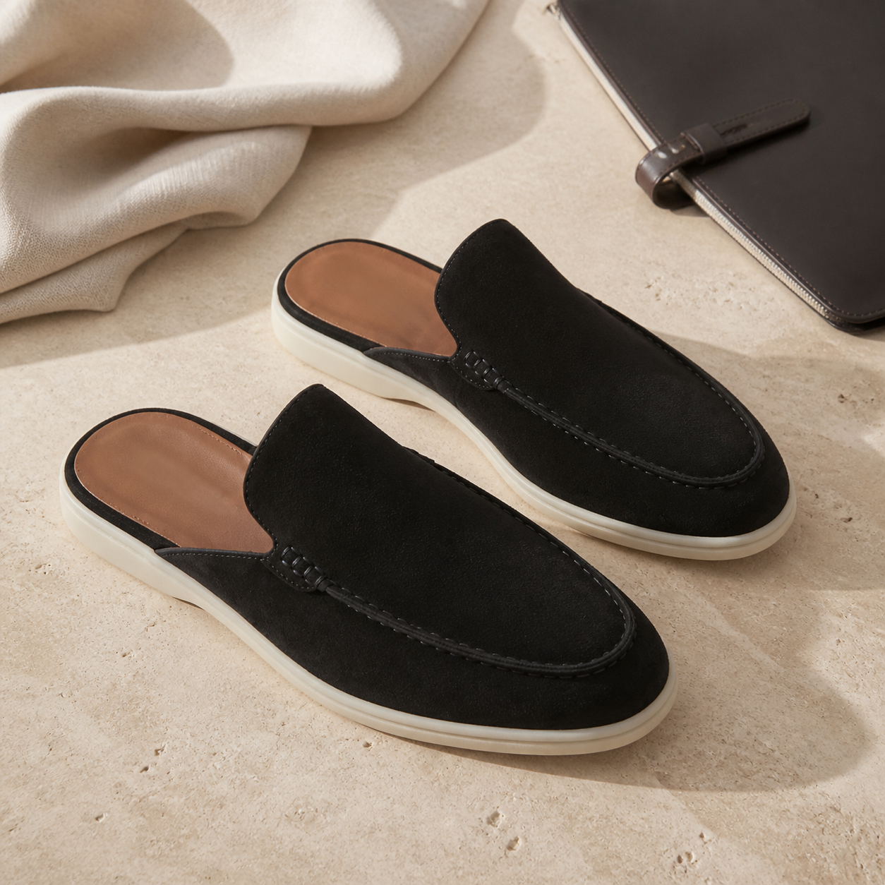 Bruce & Co Vellaro black open-back loafers in a refined still-life