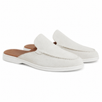 Vellaro white open-back loafers pair three quarter