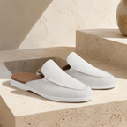 Vellaro white mule loafers travertine editorial