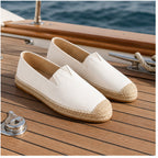 White Wynmont canvas espadrilles on a yacht deck