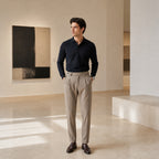 Wynvane beige pleated trousers styled in a contemporary gallery