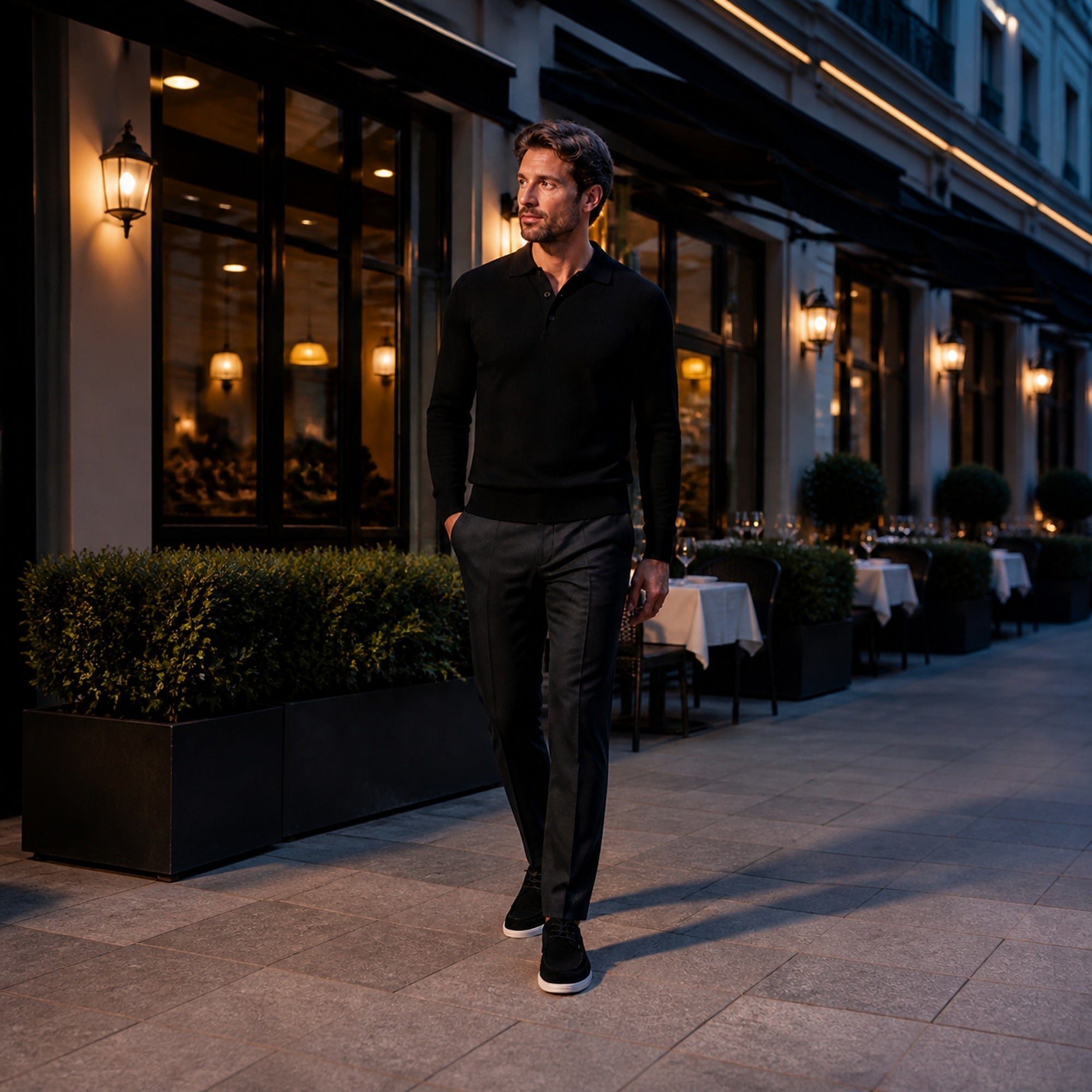 Xavemere black suede shoes styled outside a European restaurant