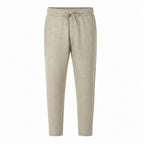 Khaki Xaverel men's linen drawstring trousers on a pure white studio background