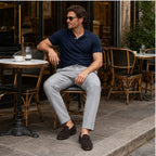 Light grey Xaverel linen trousers styled at an elegant outdoor cafe