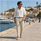Khaki Xaverel linen trousers styled on a marina promenade
