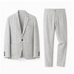 Grey Yorevaro men's linen summer suit on a pure white studio background